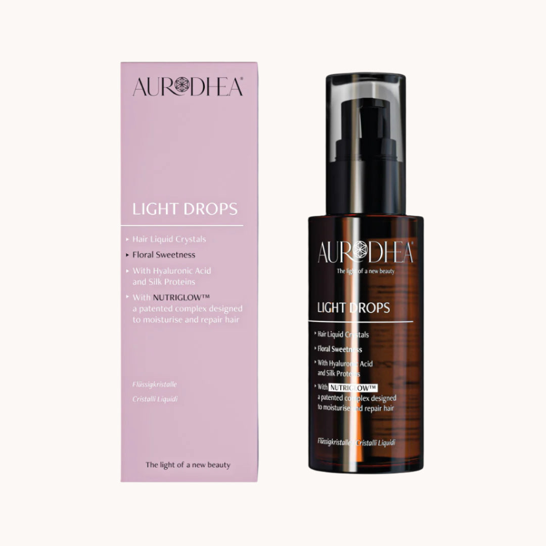 Aurodhea Flüssigkristalle Light Drops mit Honig und Kamille, pflegendes Haaröl für blondes und strapaziertes Haar in transparenter Flasche
